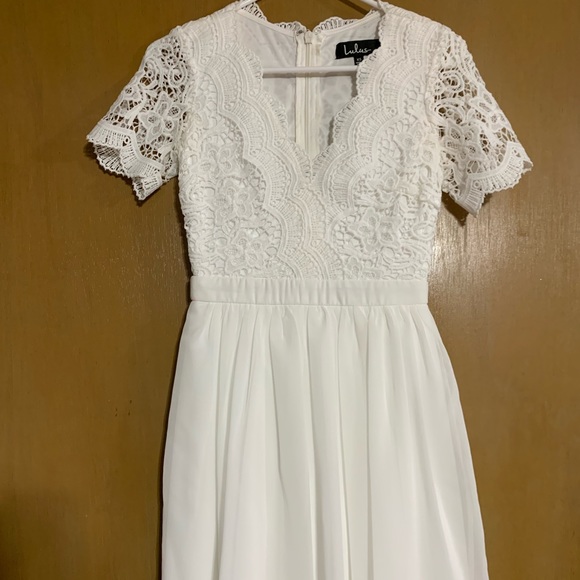 Short formal dress - Picture 1 of 7